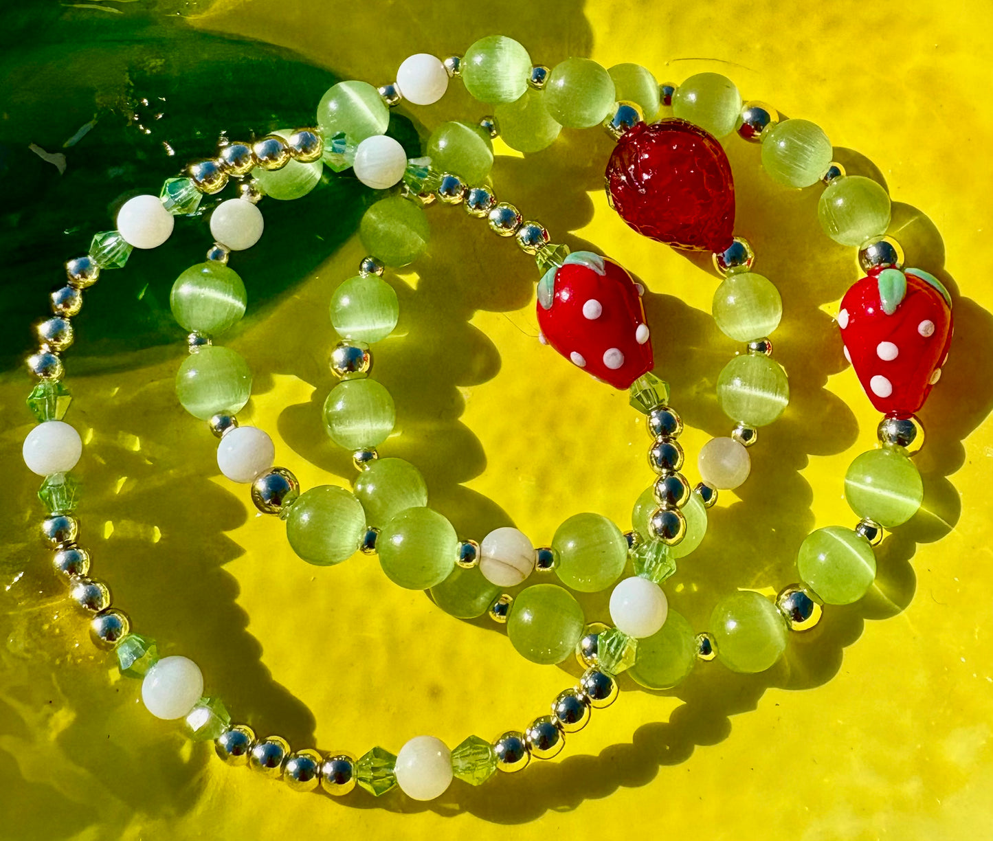 Strawberry Charm Beaded Bracelets. Porcelain Strawberry Bracelets in 3 different styles.