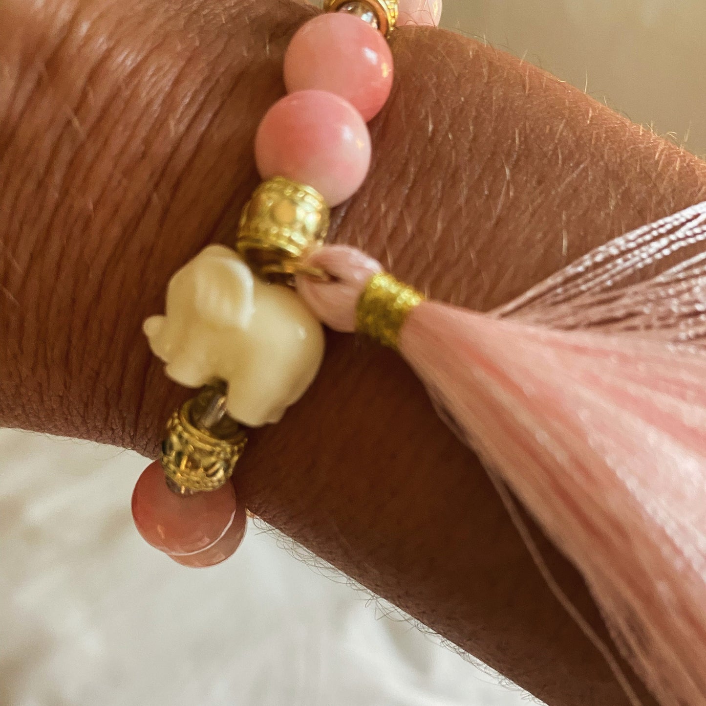 Pink Beaded Bracelet: Center Enamel Elephant Charm, 14K Gold Gold Accents.