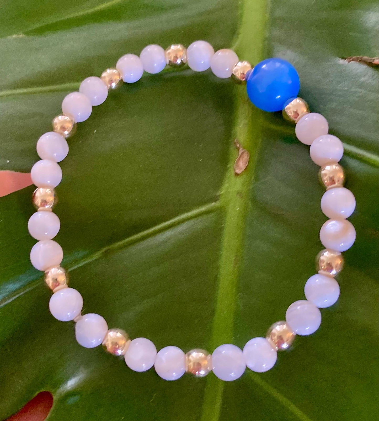 White Shell Beaded Bracelet: 14K Gold Filled, Center 10mm Blue Cats Eye Stone.