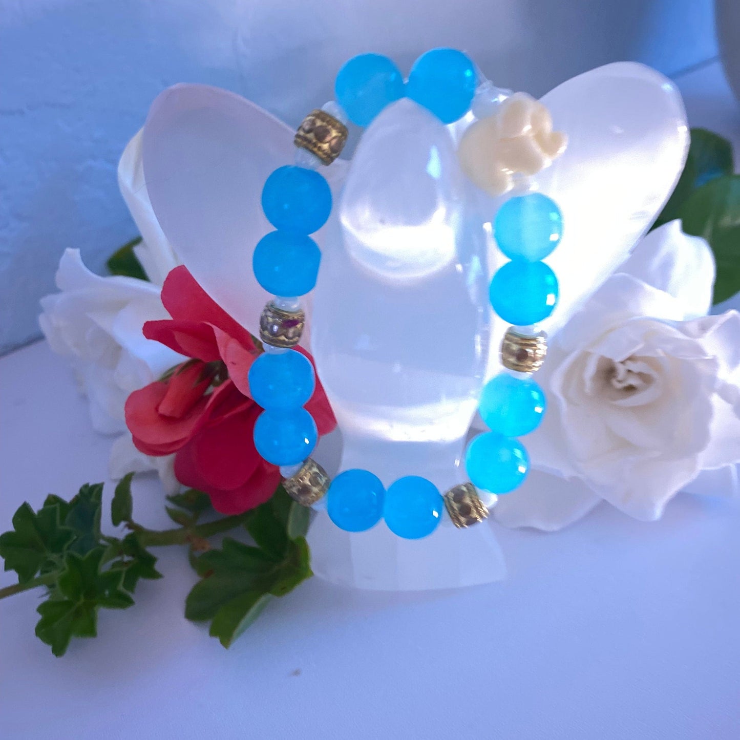 Aquamarine Glass Beaded Bracelet: White Resin Elephant Charm, 14k Gold Accents.