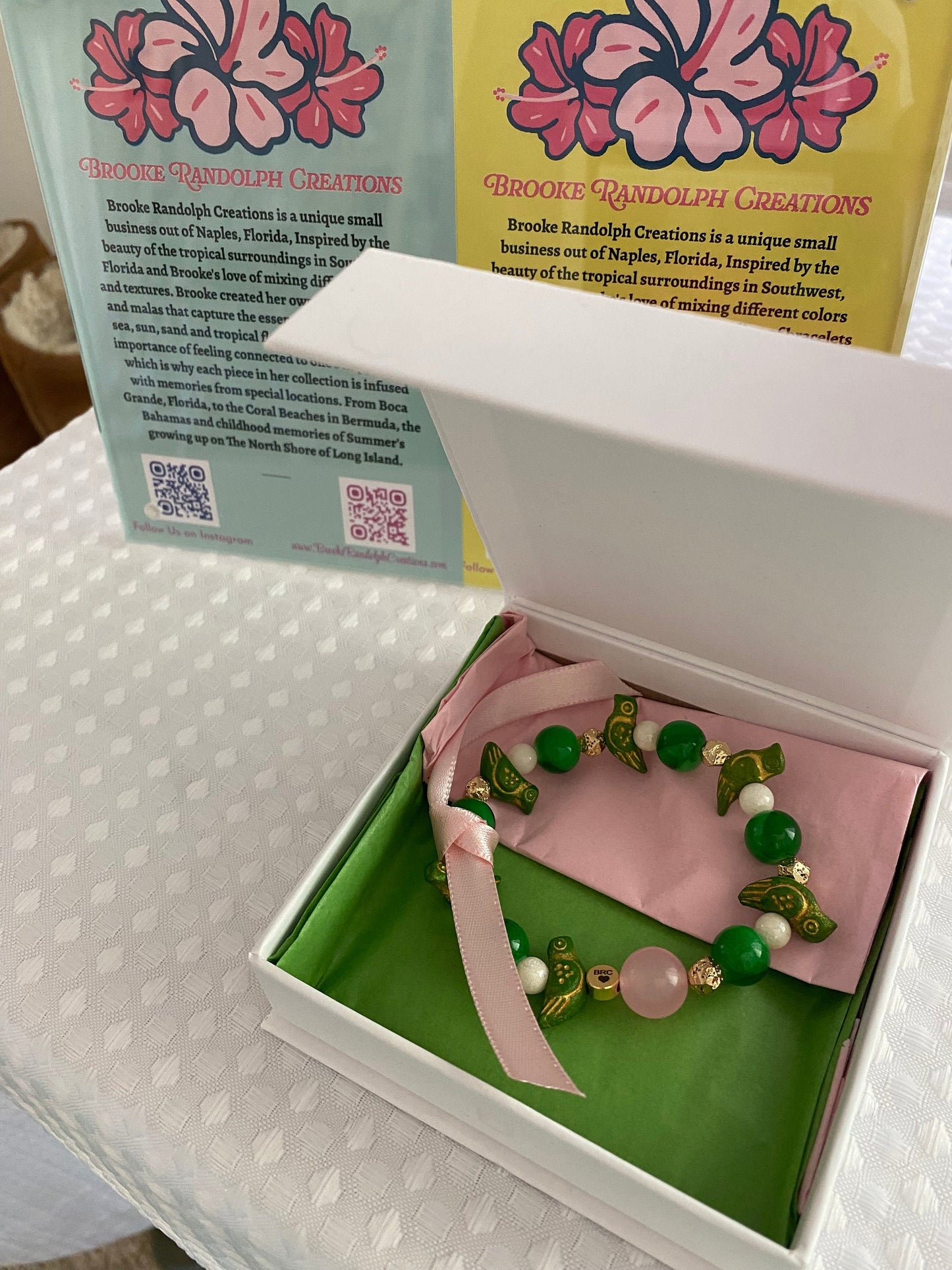 Jade Green Beaded Bracelet: Ceramic Parrot Charms, 10mm Pink Center Glass Bead.