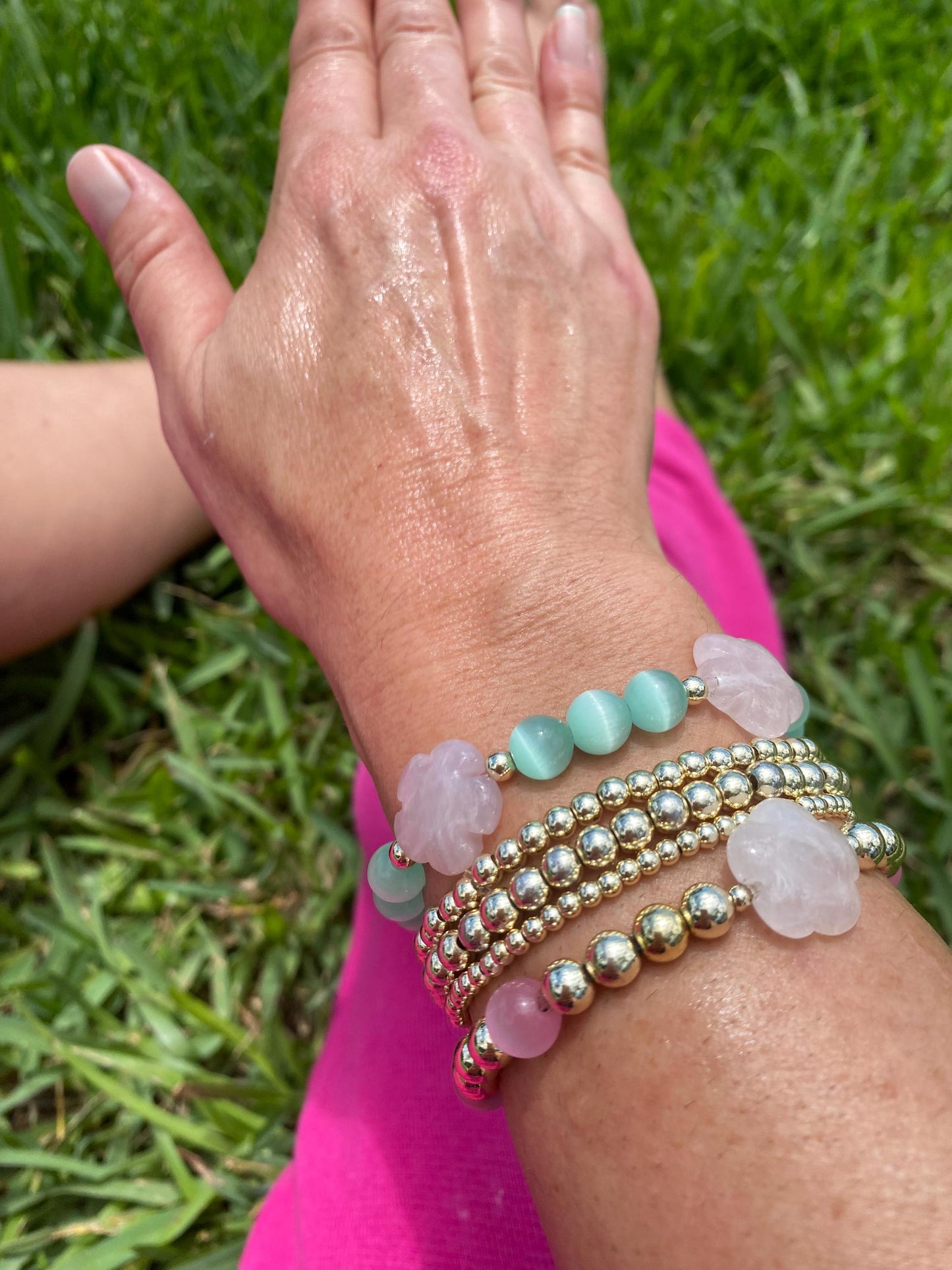 14k Gold Filled Beaded Bracelet: Center Rose Quartz Flower Charm.