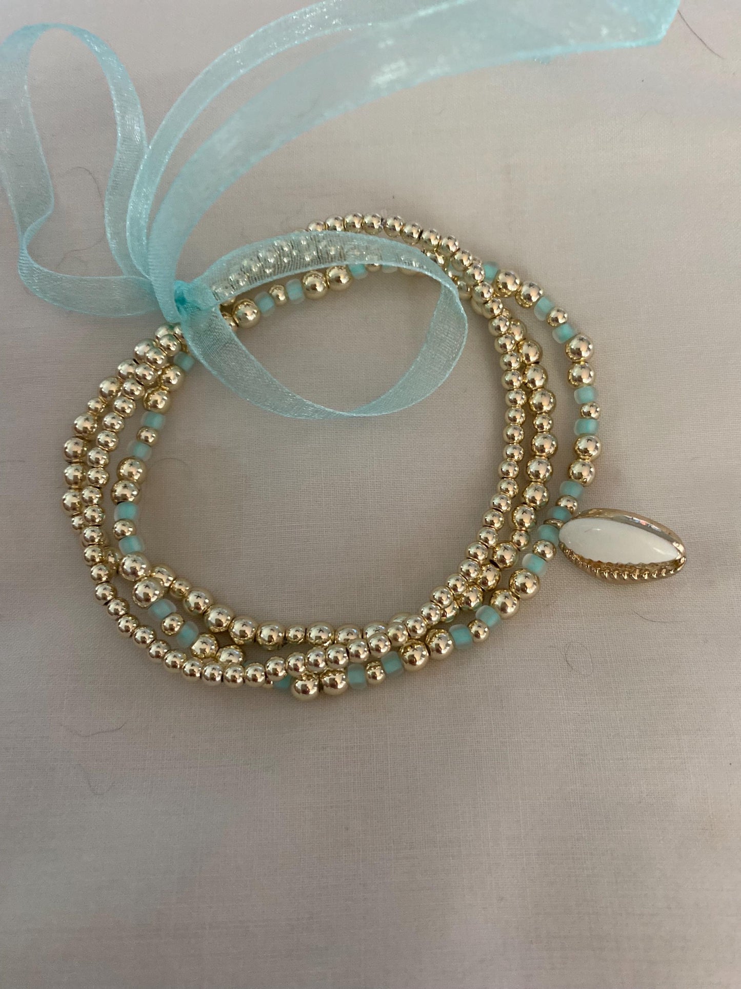14K Gold Filled Beaded Bracelet Set. Shell Charm and Aqua Blue Glass Seed Beads