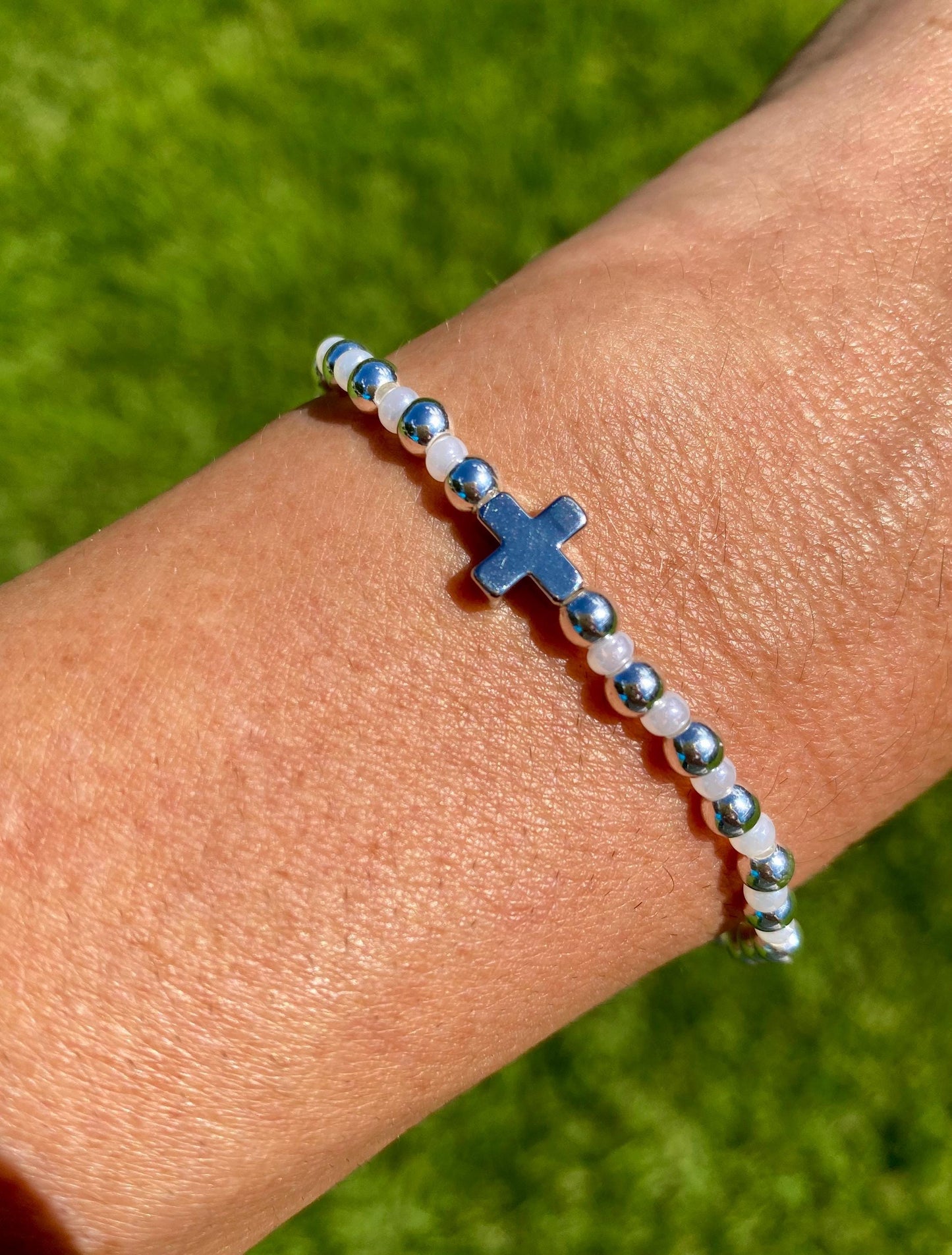 Silver Plated Beaded Bracelet: Platinum Plated Center Cross Charm, Pearl Czech Glass.