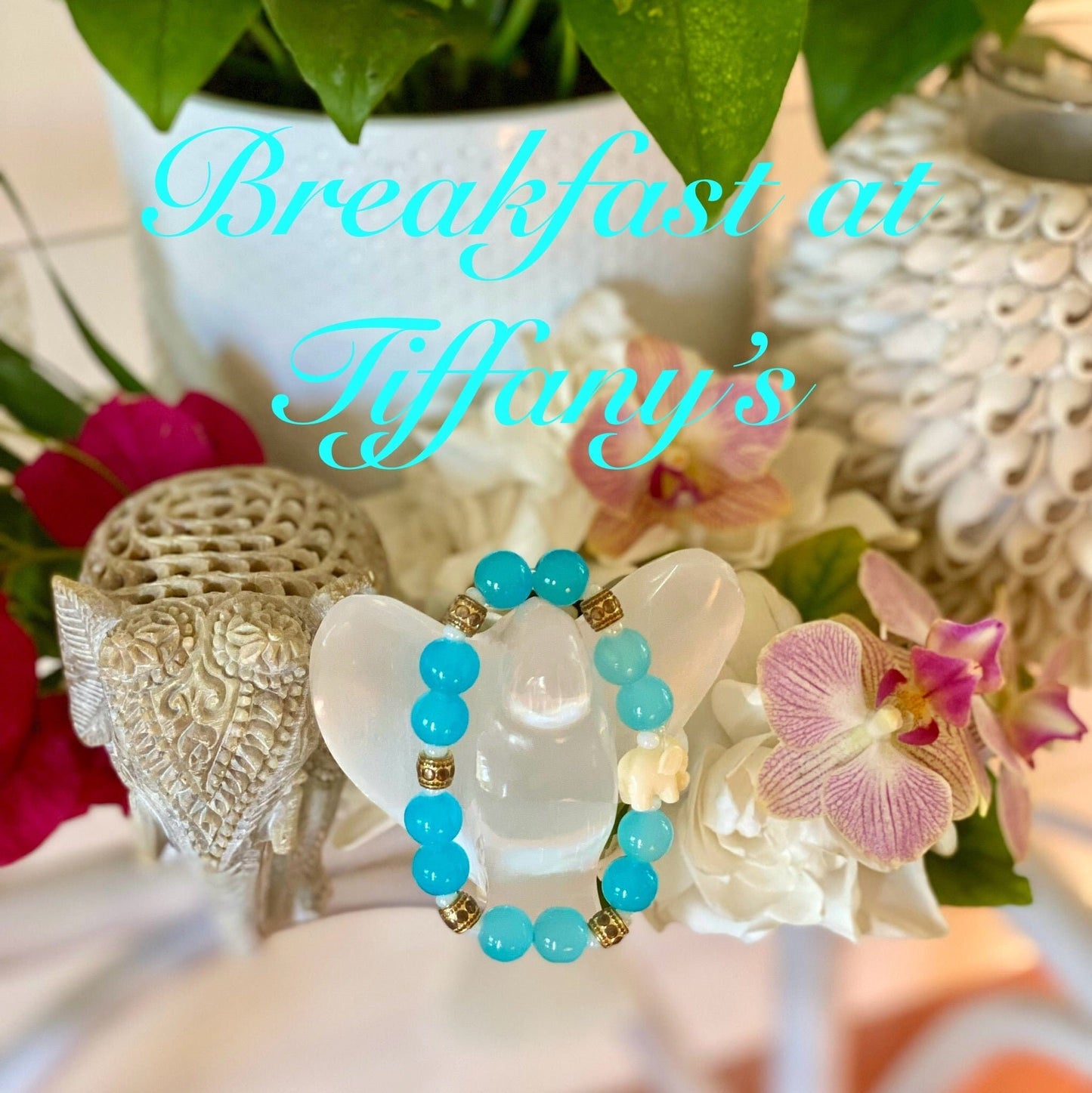 Aquamarine Glass Beaded Bracelet: White Resin Elephant Charm, 14k Gold Accents.