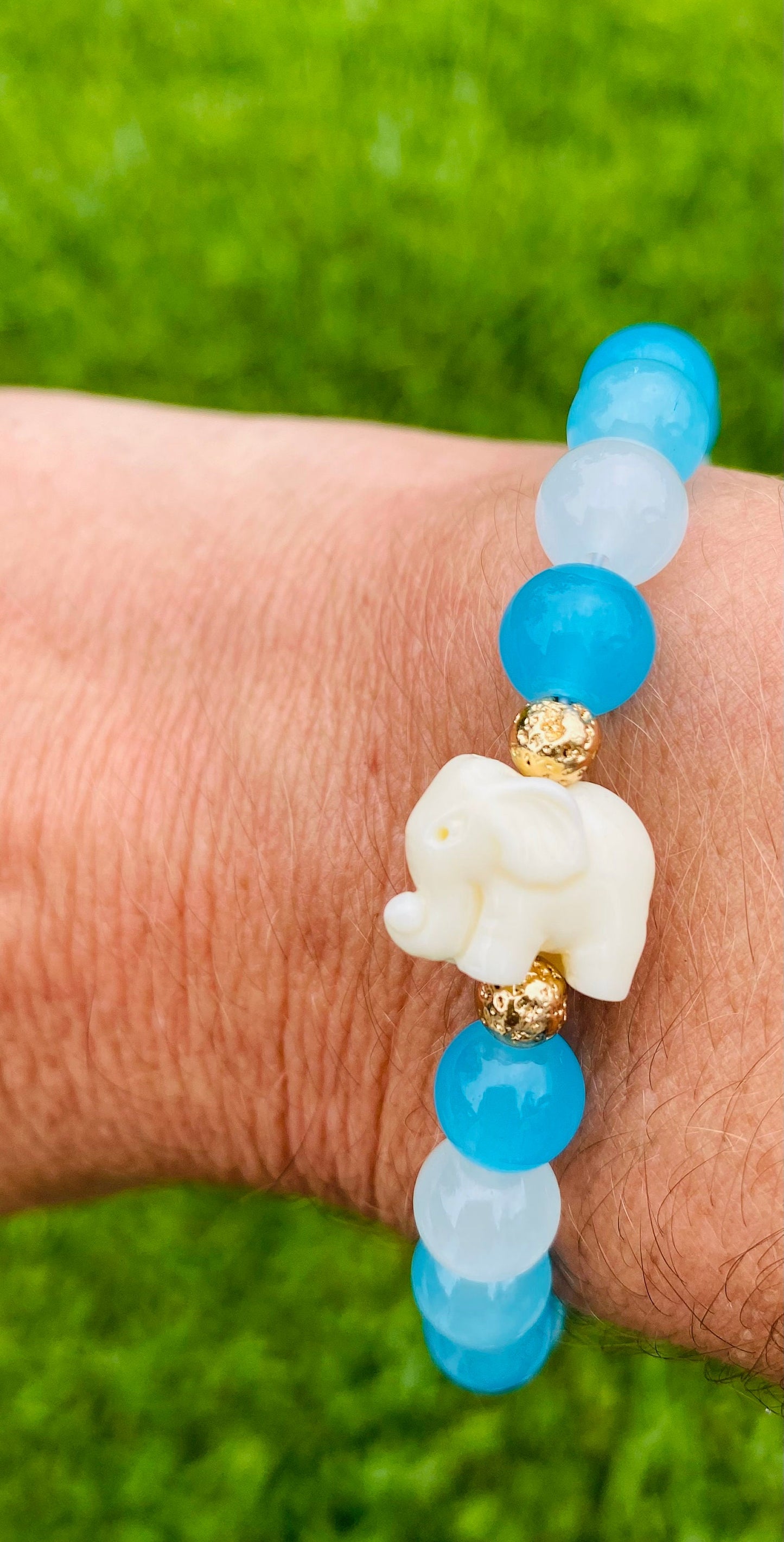 Aquamarine Glass Beaded Bracelet: White Resin Elephant Charm, 14k Gold Accents.