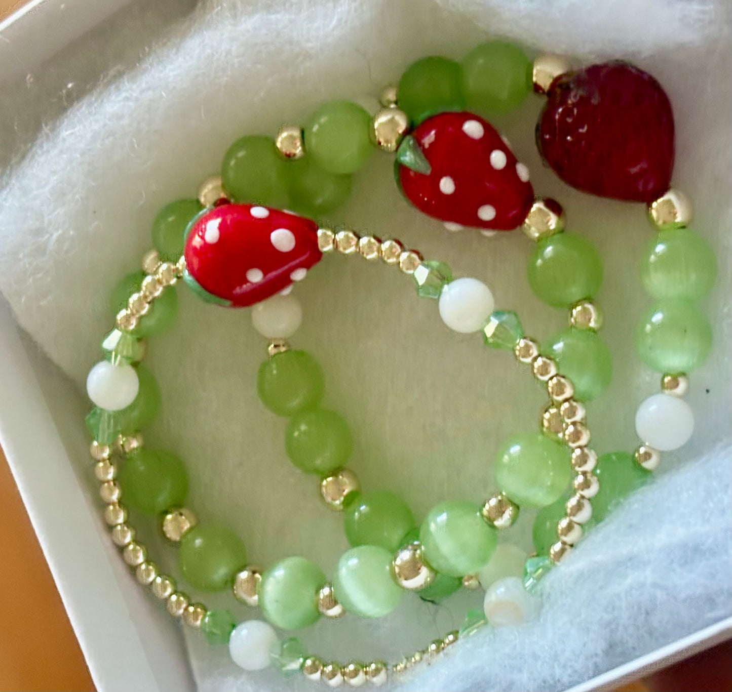 Strawberry Charm Beaded Bracelets. Porcelain Strawberry Bracelets in 3 different styles.
