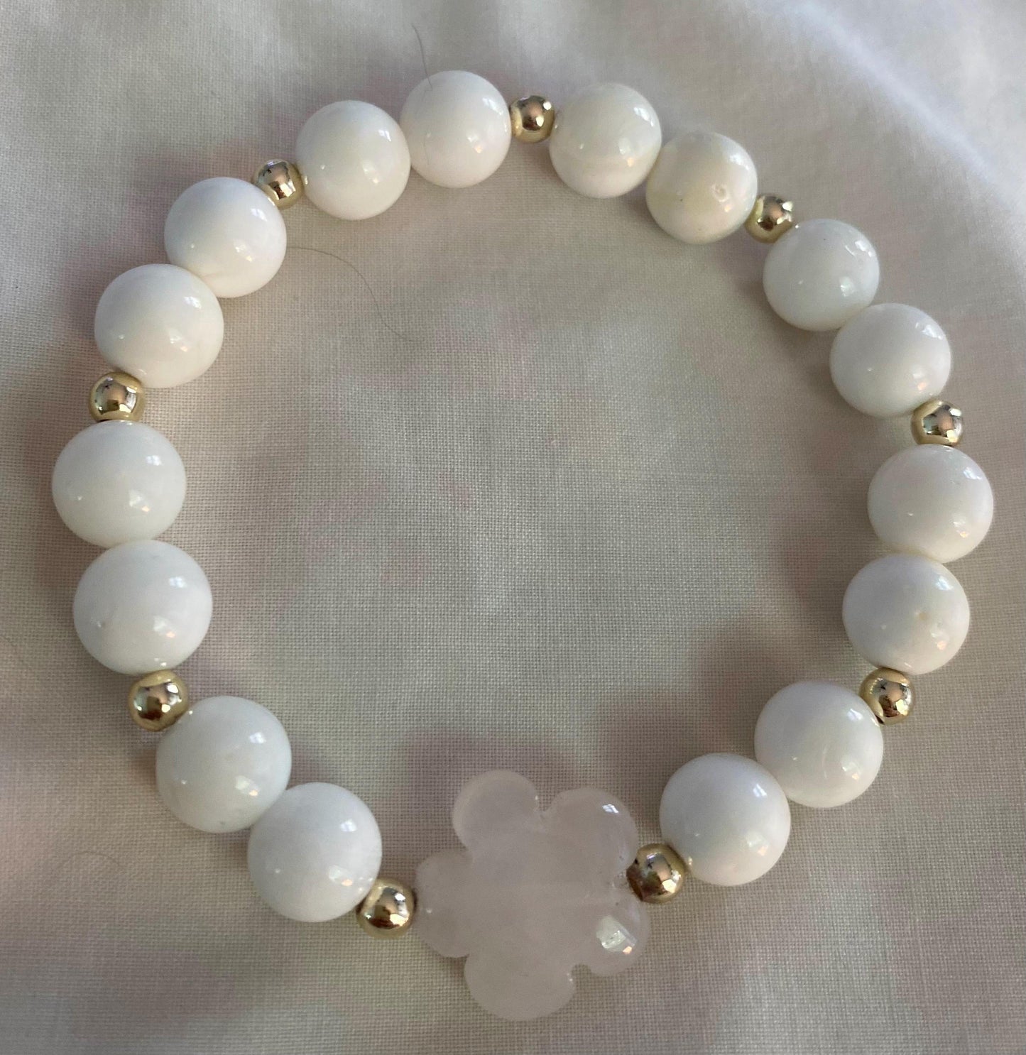 Rose Quartz Flower Charm Bracelet: 14k Gold & White Shell Beads.