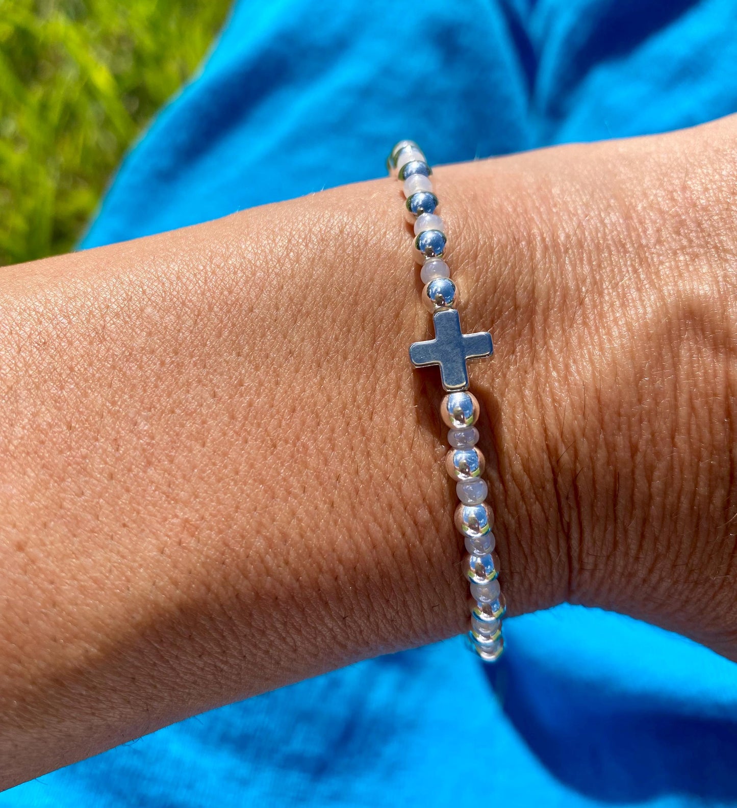 Silver Plated Beaded Bracelet: Platinum Plated Center Cross Charm, Pearl Czech Glass.